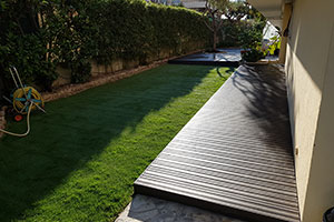 Terrasse en lames composite + pose gazon synthétique